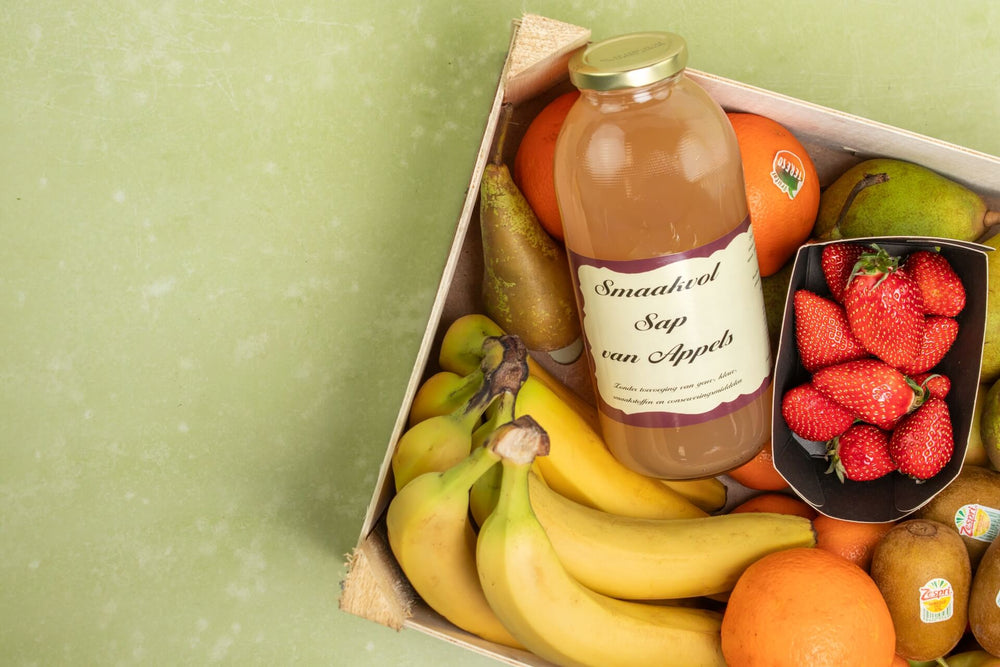 fruitbox met vers fruit zoals appels bananen en mandarijnen van fruitmaatje